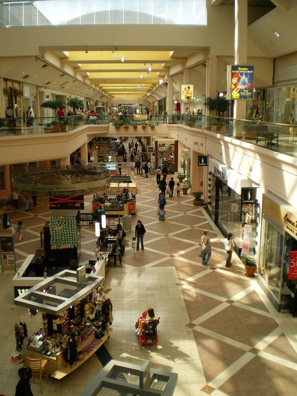 Interior View of Westfield Fashion Square with People in it