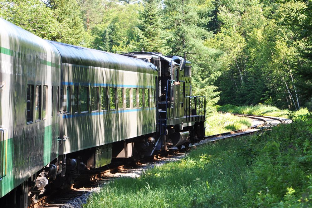 A train passing through the Adirondack Scenic Railroad