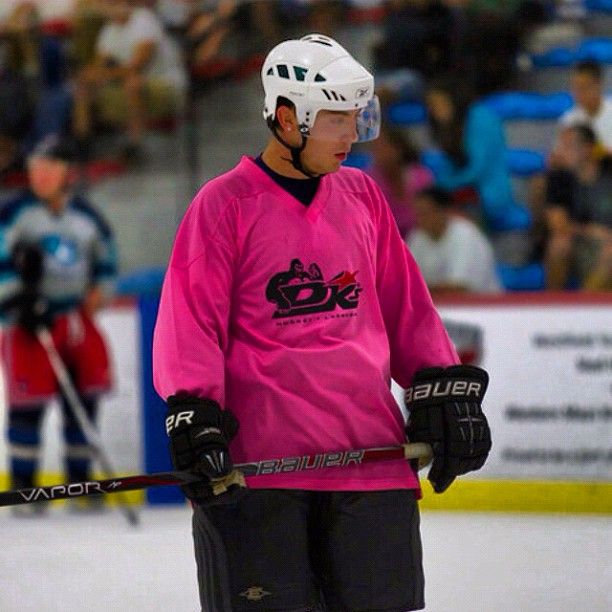 A player playing ice hockey at Amelia Park Ice Rink