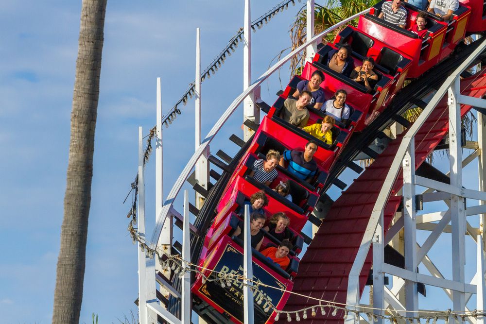 Visitors enjoying the rollercoaster ride at Belmont Park