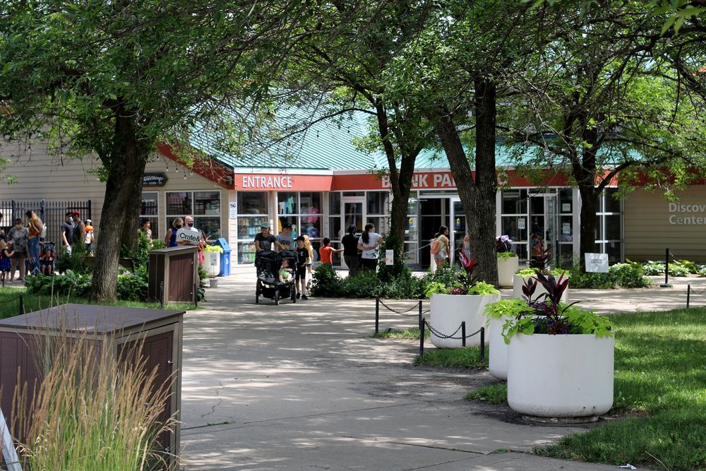 Tourist waiting in the entrance of Blank Park Zoo