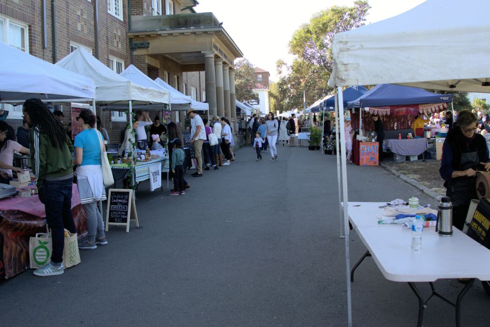 People buying products at Bondi’s Weekend Markets