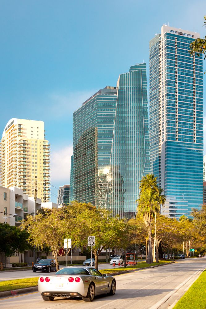 A car along Brickell Avenue's road
