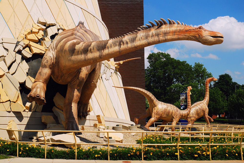 Dinosaur sculptures in front of Children's Museum of Indianapolis