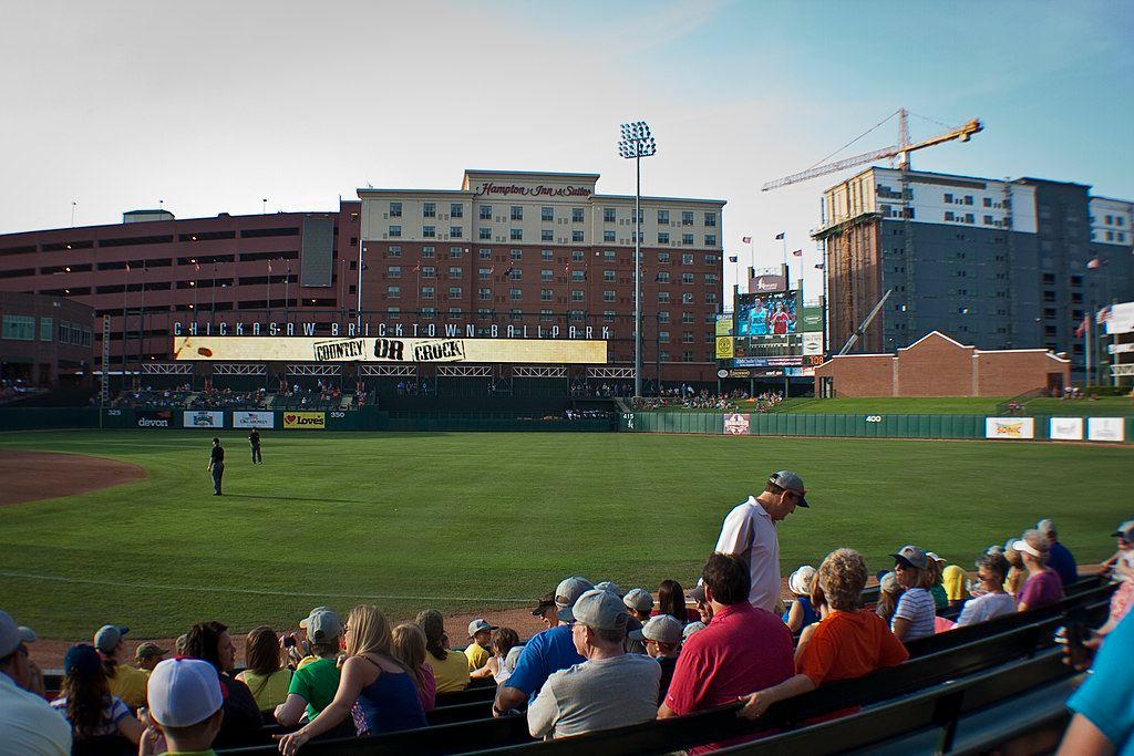 People enjoying the game at Chickasaw Bricktown Ballpark