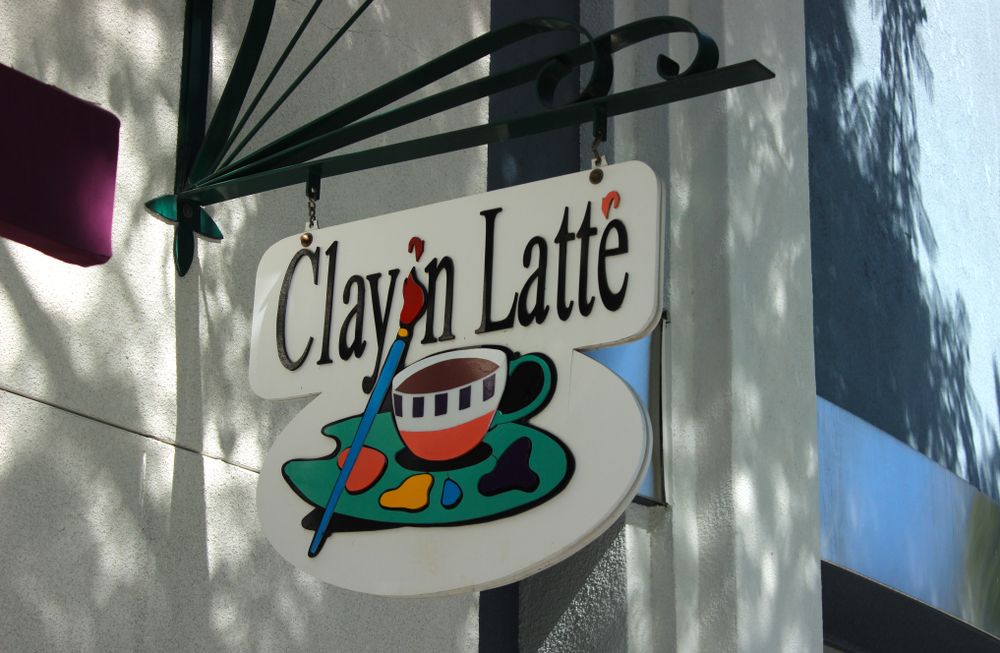 Signage of Clay ‘N Latte