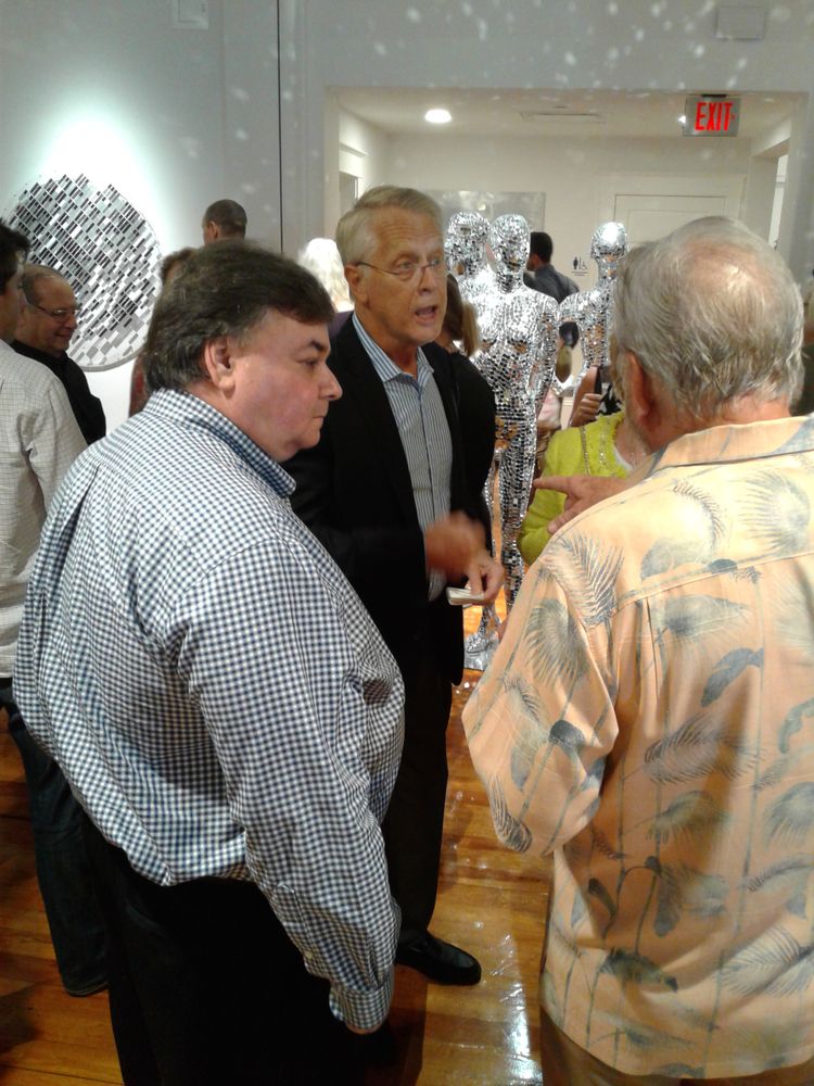 People enjoying their time at Cornell Art Museum