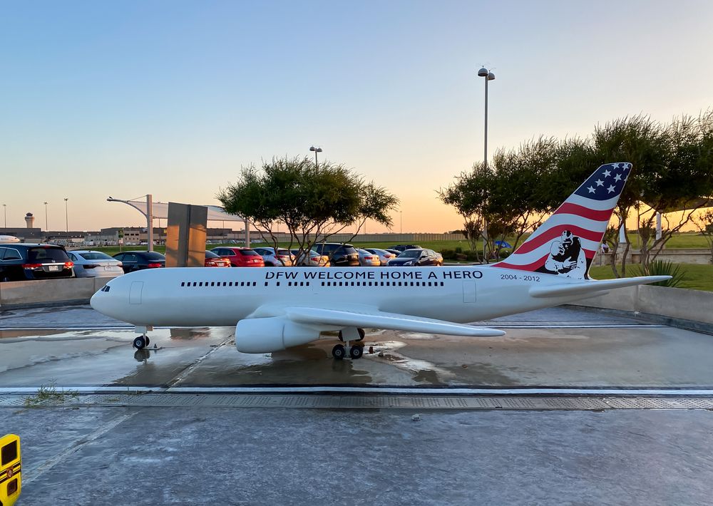 An aircraft on the grounds of DFW Founders Plaza