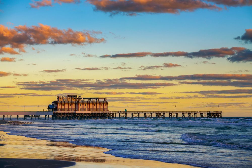 Daytona Beach Boardwalk and Pier during sunrise