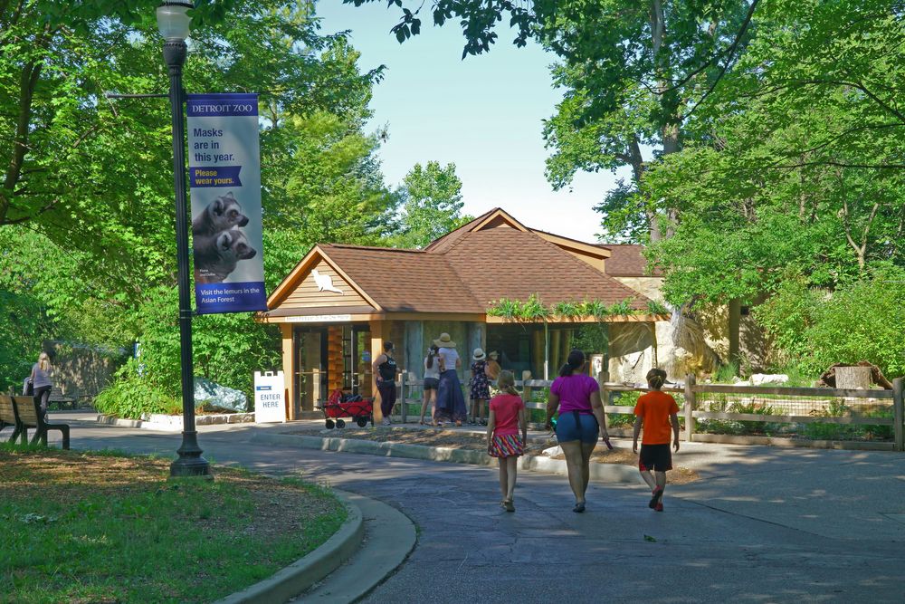 Visitors strolling around the Detroit Zoo