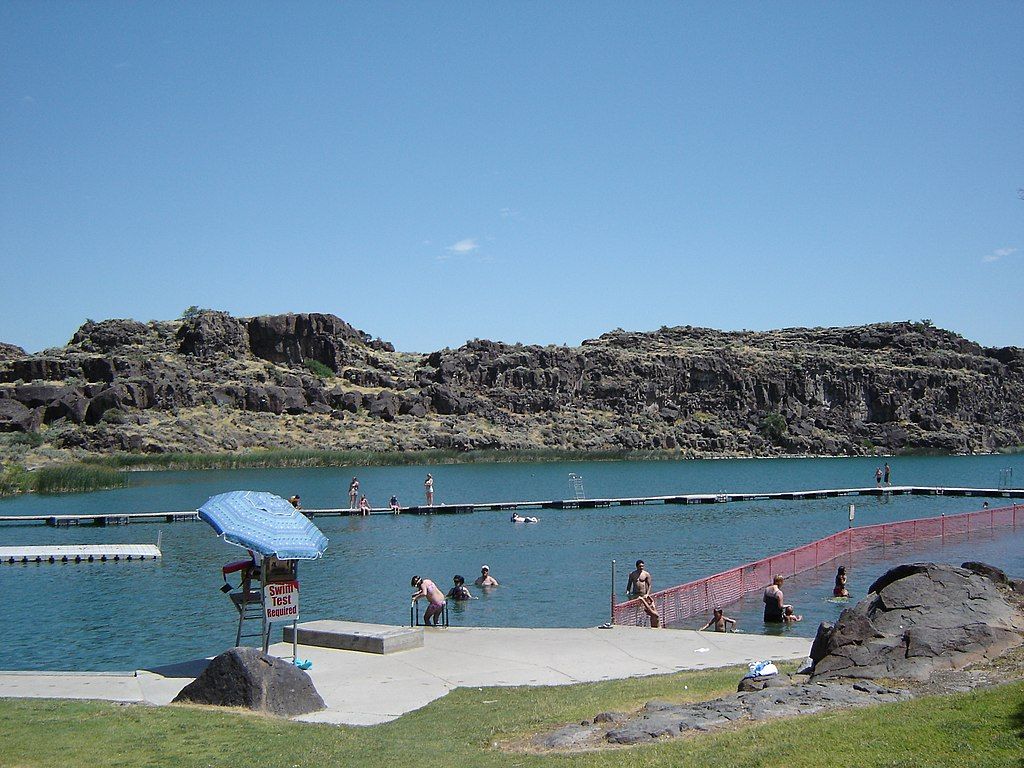 People swimming in a beach at Dierkes Lake Park
