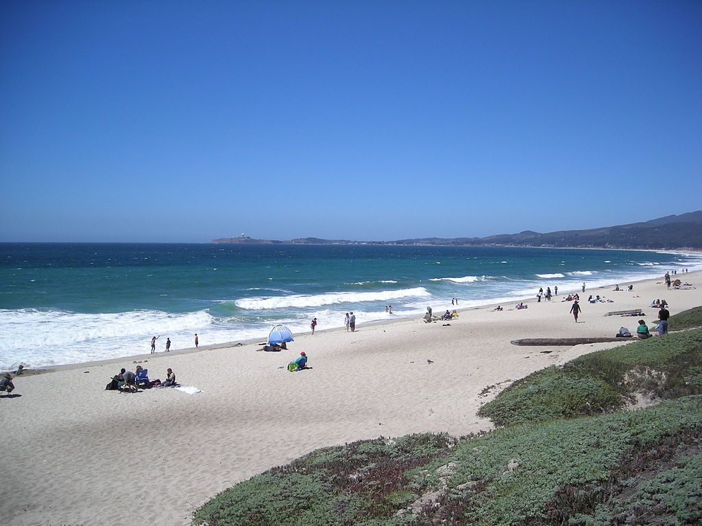People enjoying the sun at Francis Beach