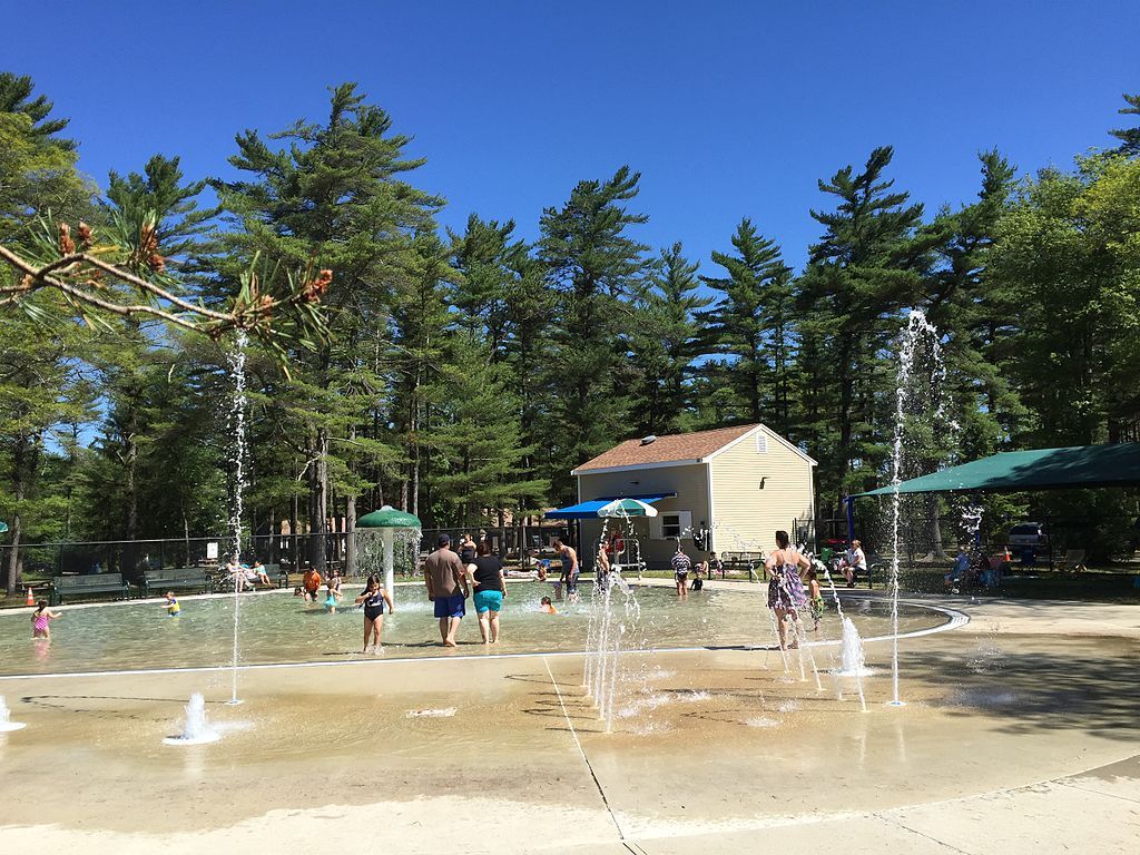 Kids playing in the splash pad at Freetown-Fall River State Forest