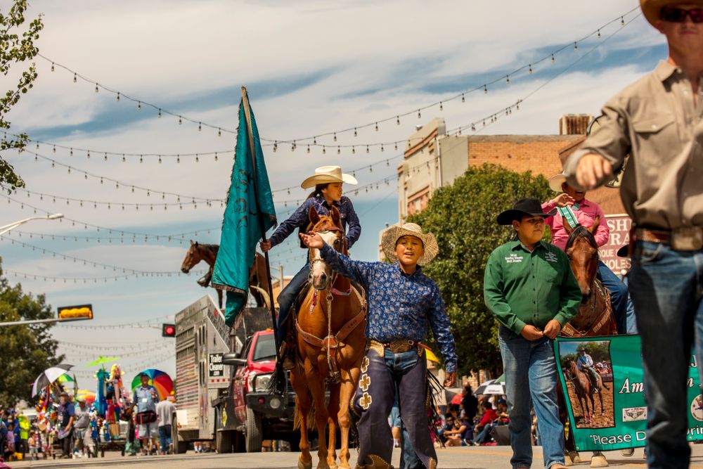 A person riding a horse during Gallup Inter-Tribal Indian Ceremonial