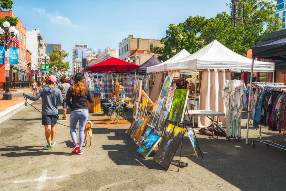 Art frames displayed on the street at Gaslamp Artisan Market