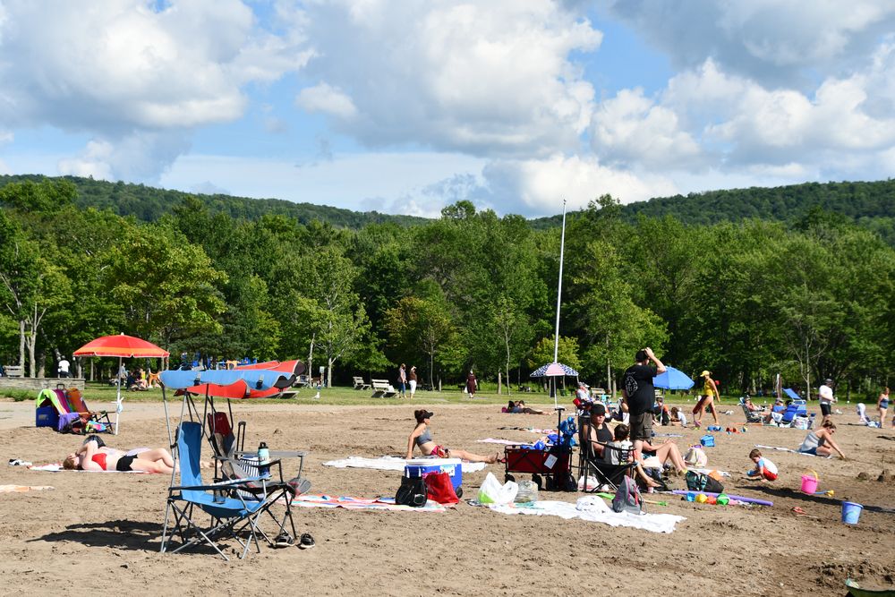 People relaxing at Glimmerglass State Park