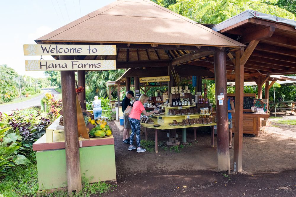 Hana Farms fresh produce under a hut