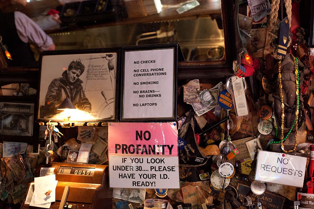 A wall filled with unique objects at Heinold’s First and Last Chance Saloon