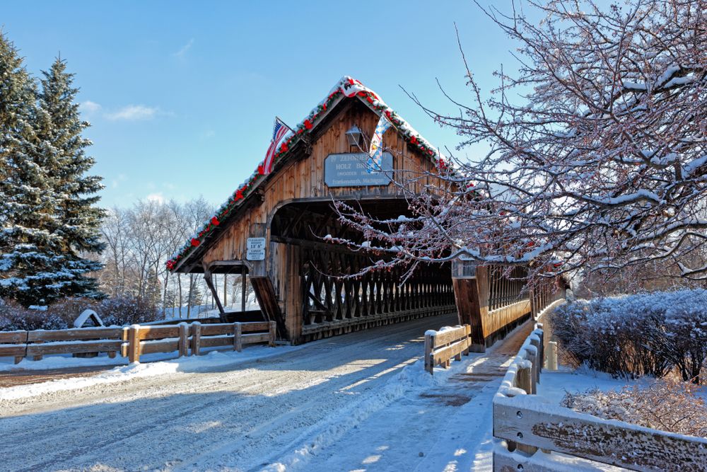 Holz-Brucke Wooden Bridge covered with snow
