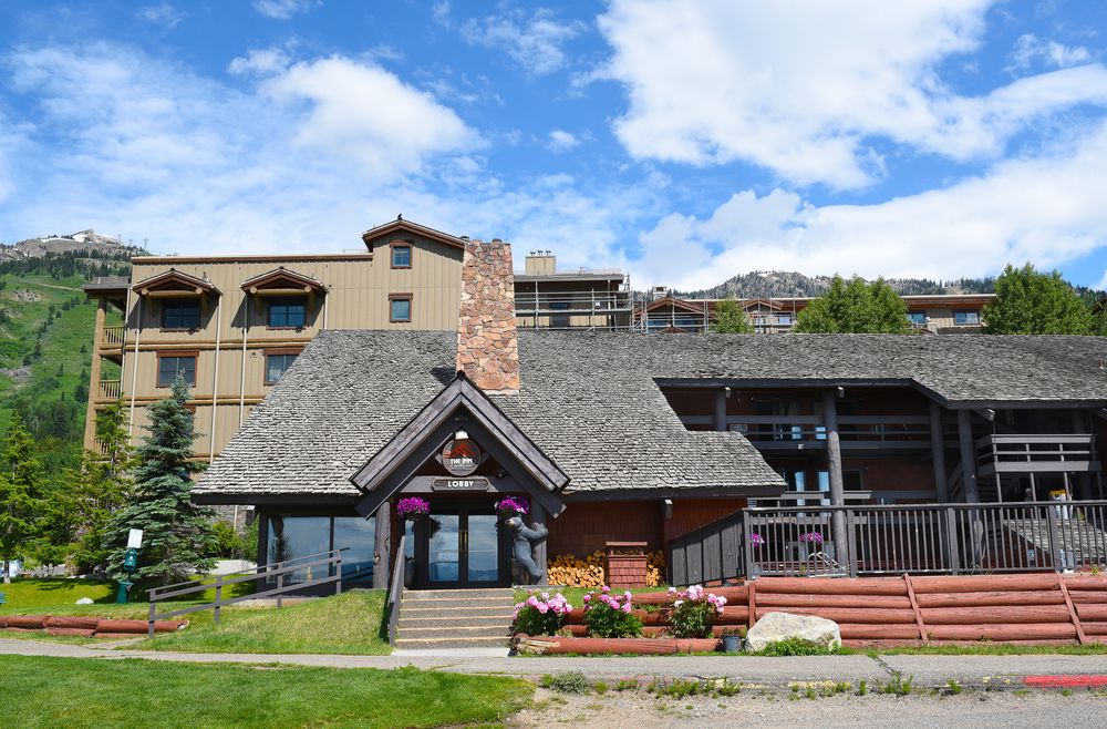 Inn at Jackson Hole with flowers and aesthetically pleasing decors in the enterance