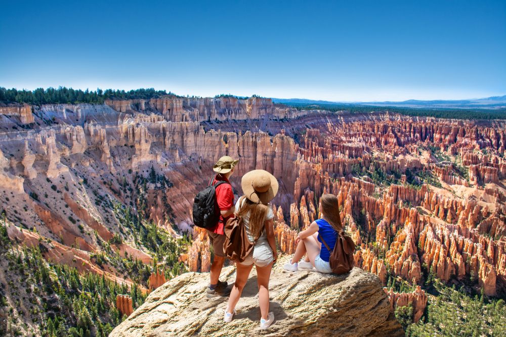 Hikers enjoying the stunning view from Inspiration Point