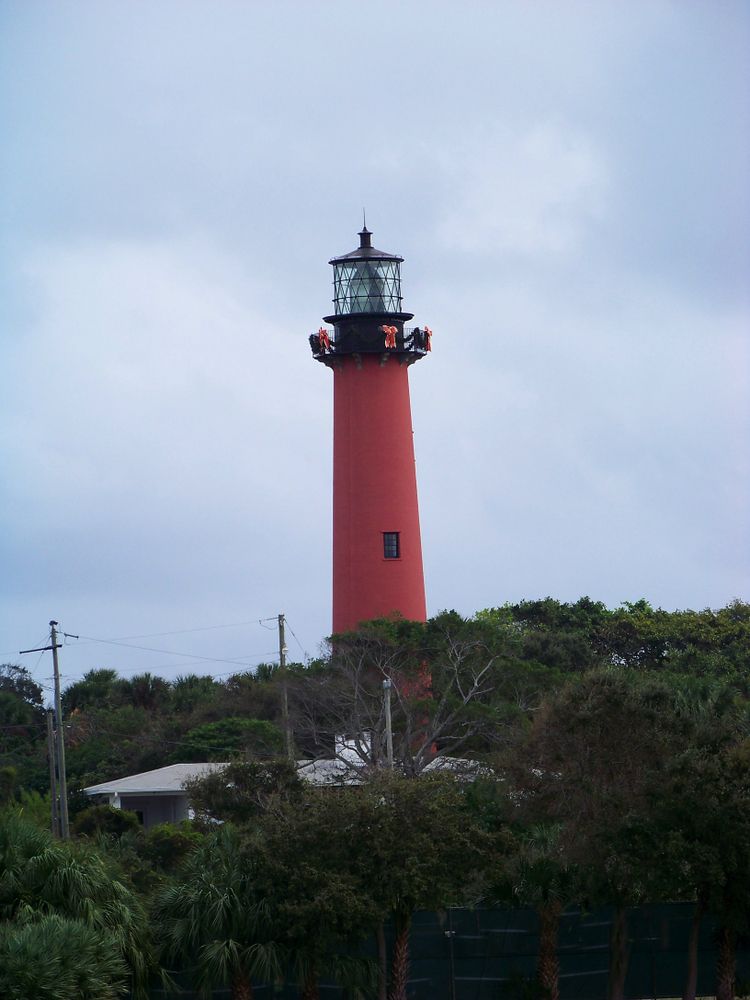 Tall red building of Jupiter Inlet Lighthouse & Museum