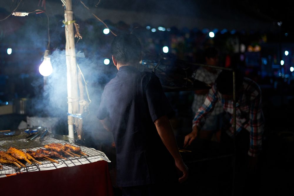 People buying grilled food at Karon Night Market