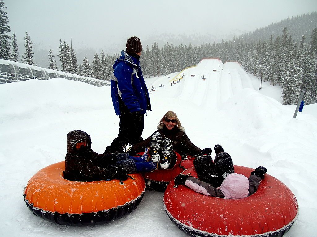 A family snow-tubing at Keystone Adventure Point Tubing Hill
