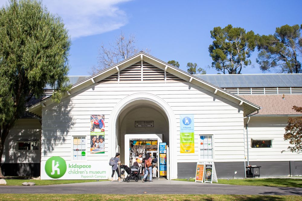 People entering the Kidspace Children's Museum