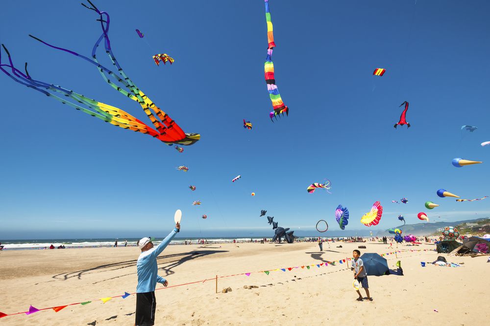Kite flying festival on a beach at Lincoln City