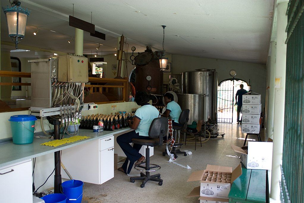 Workers packing the liquors at Landhuis Chobolobo
