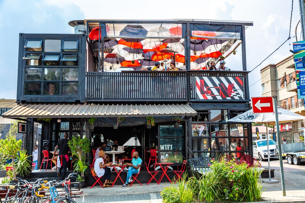 Cafe with unbrella roof decor at Maboneng Precinct