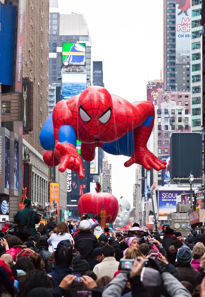 Spider man floating over the crowd at Macy's Thanksgiving Day Parade