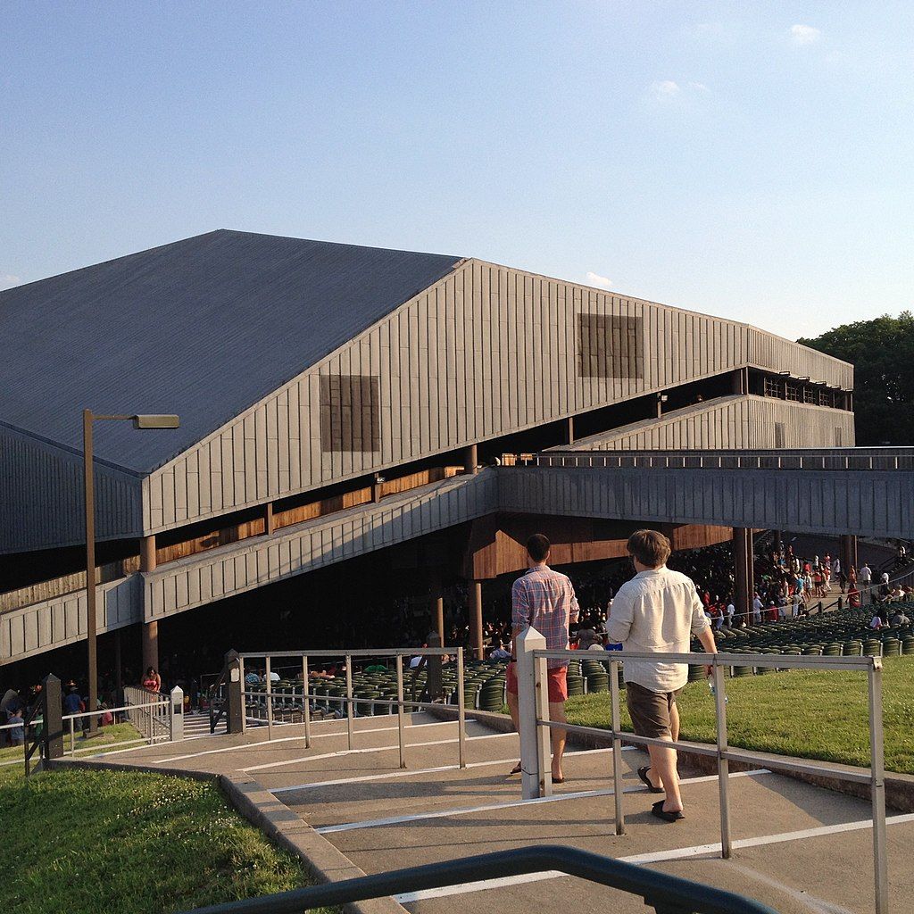 Two men walking towards their seat at Mann Center for the Performing Arts