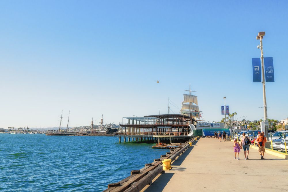 People walking towards the Maritime Museum of San Diego