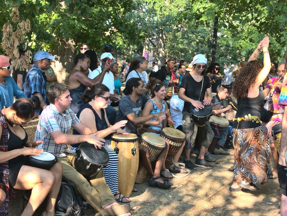 Visitors playing drums and performing at  Meridian Hill Park