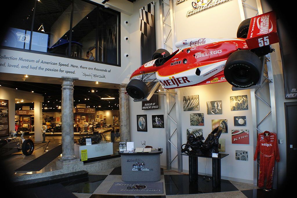 Display of sports car, pictures and other car gadgets at the Museum of American Speed