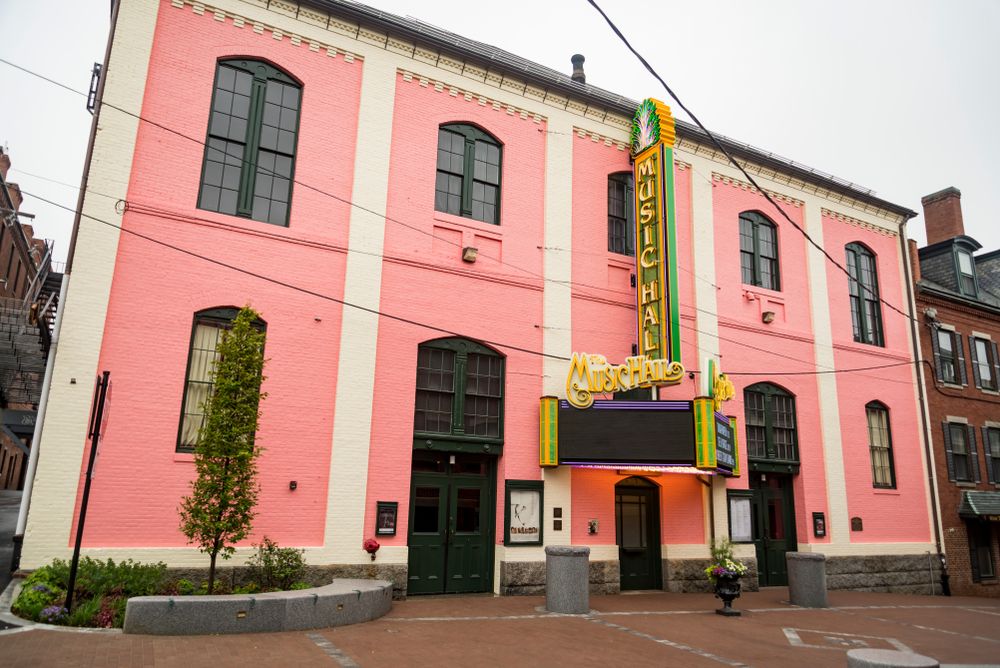 The bright pink building of the Music Hall