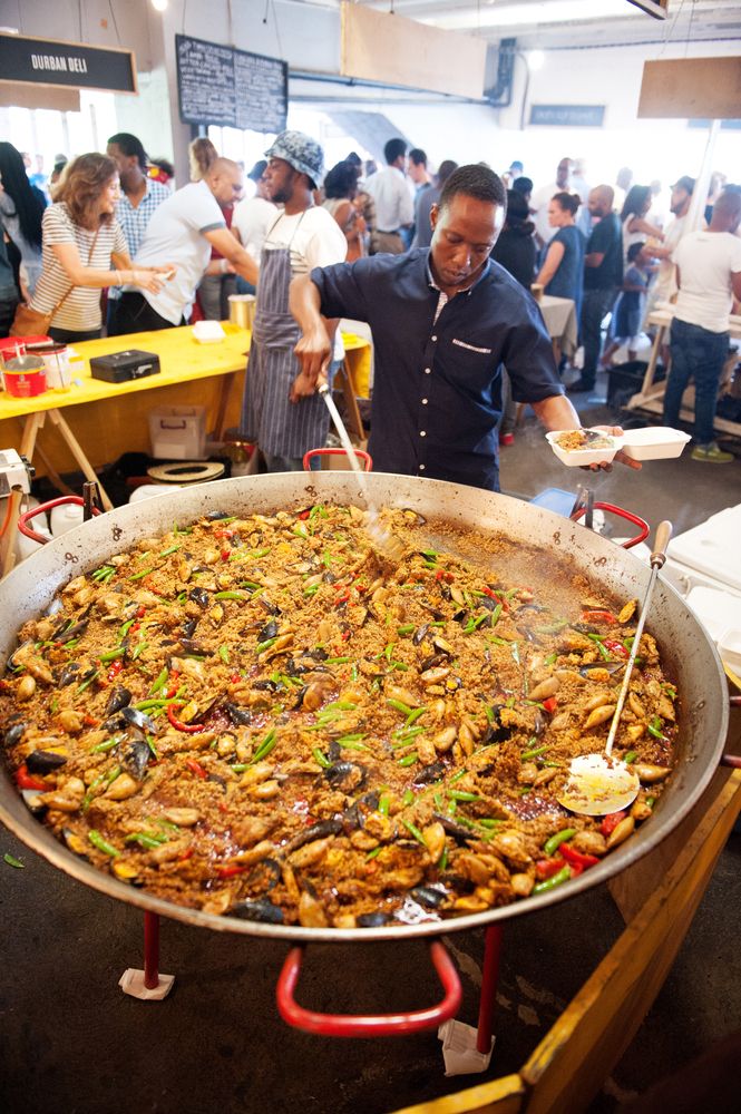 Mouth watering delicious food being prepared in large quantity at Neighbourgoods Market