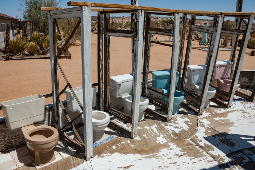 Exhibit made out of old toilet seats at Noah Purifoy Desert Art Museum