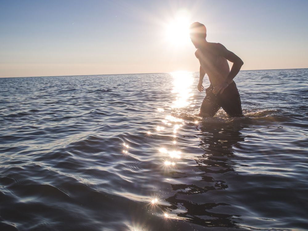 A man enjoying a sunny day at Nordhouse Dunes Wilderness