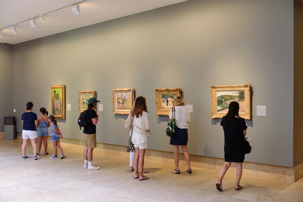 People admiring the paintings at Norton Simon Museum