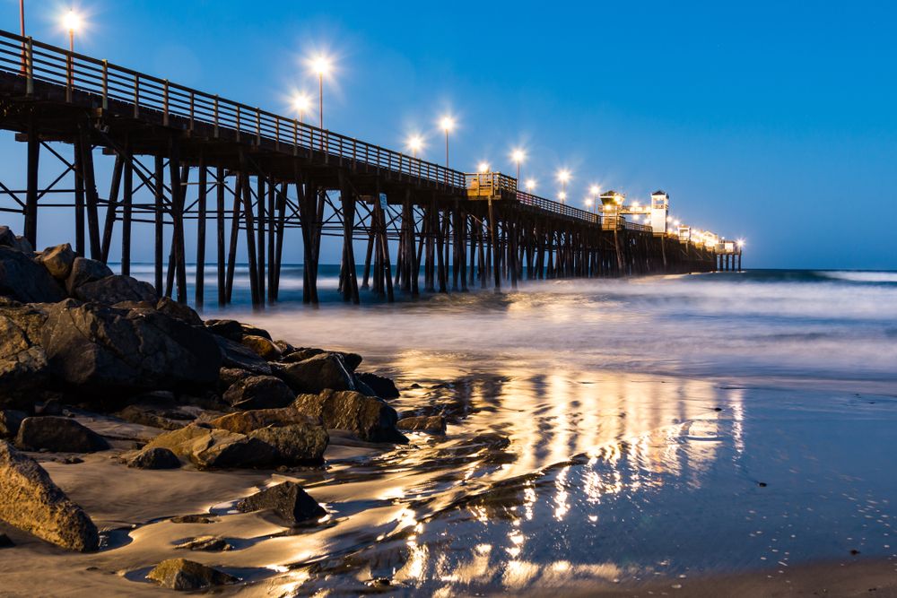Oceanside Pier lit up during night