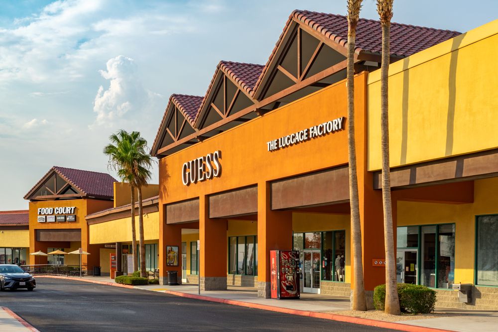 Guess store and the food court of Outlets at Barstow