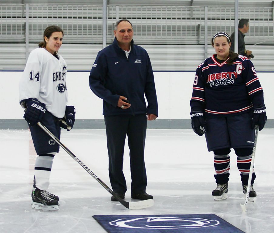 Hockey players in Pegula Ice Arena