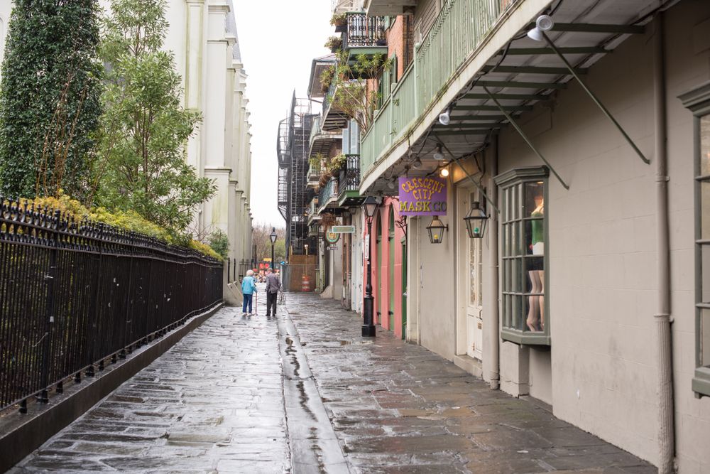People walking along Pirate's Alley