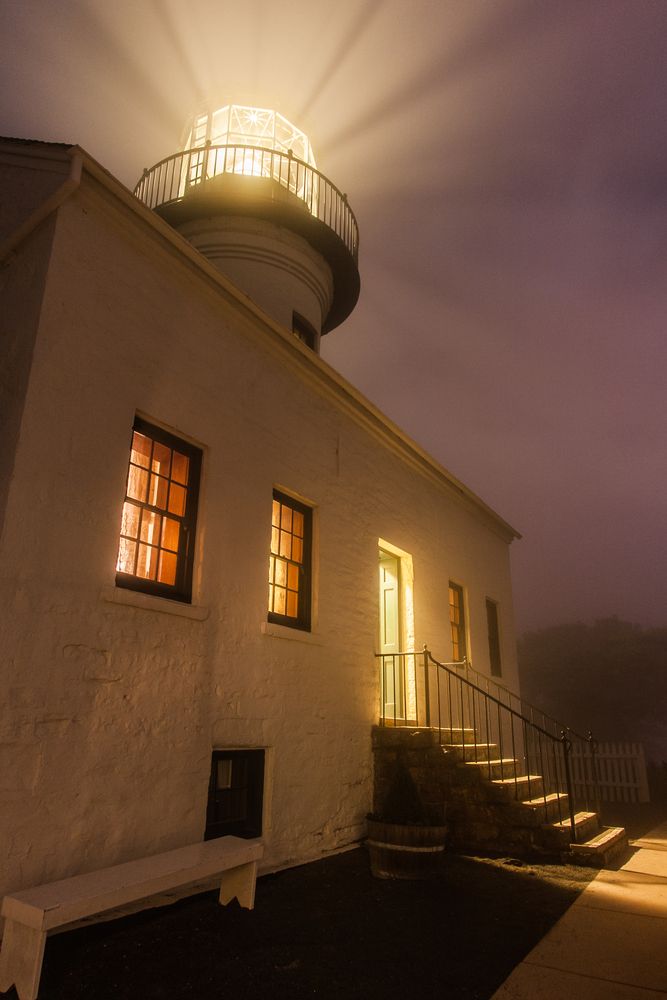 Point Loma Lighthouse emitting bright light during night