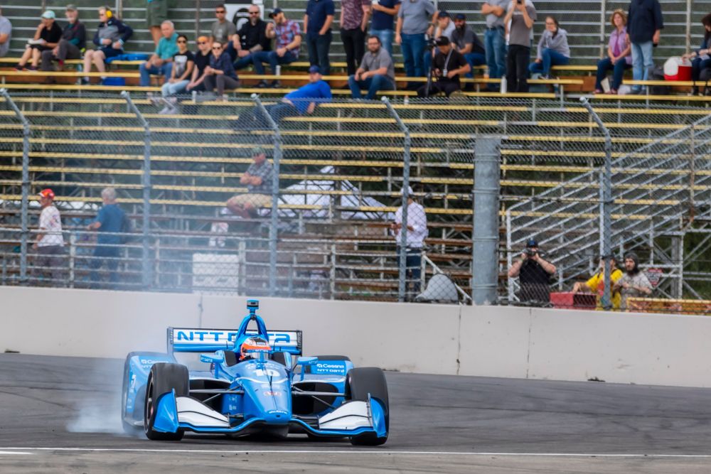 People watching a car race at Portland International Raceway