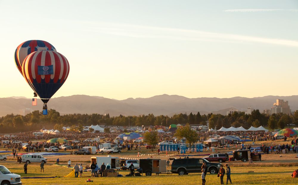 Cars, Trucks, and RVs parked at Rancho San Rafael Park to watch the Reno Balloon Race