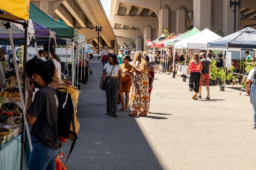 People walking around the Riverside Arts Market